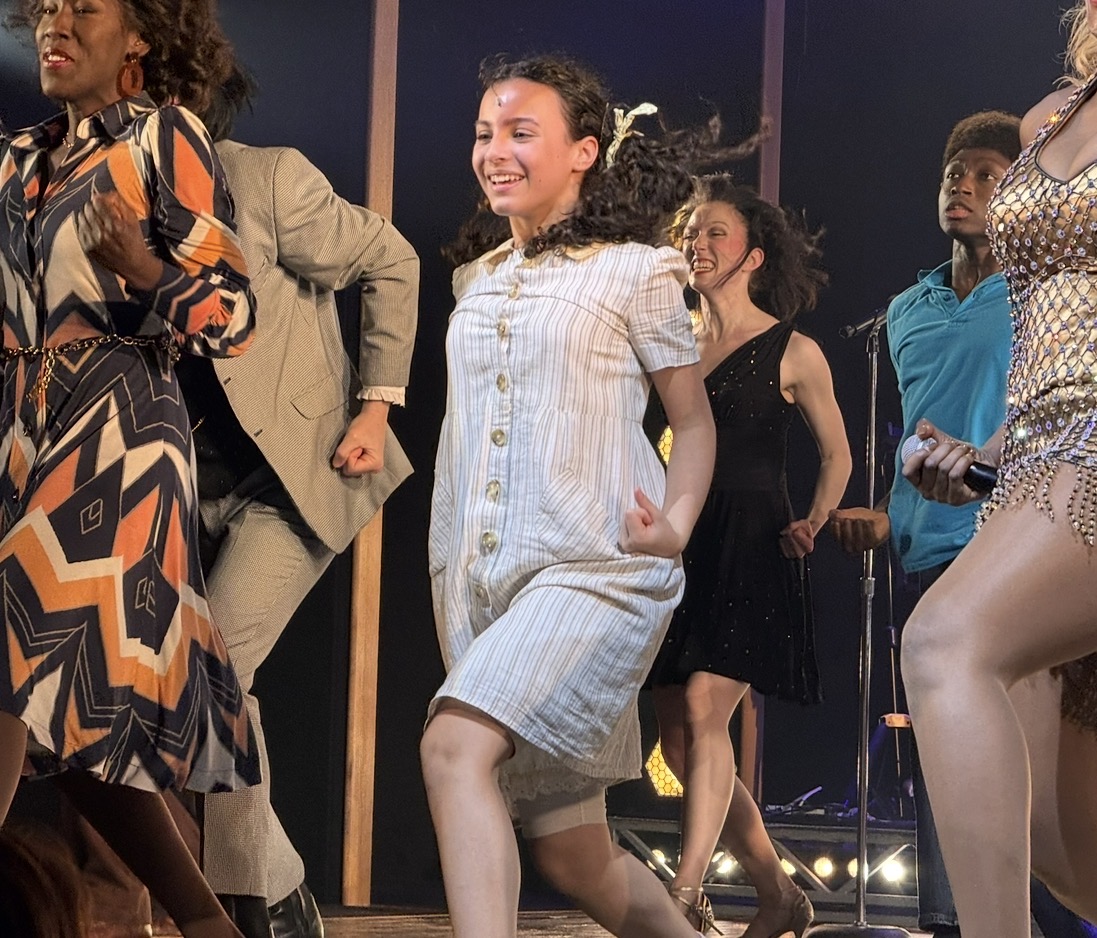 Bianca Papa performing with the Annie company