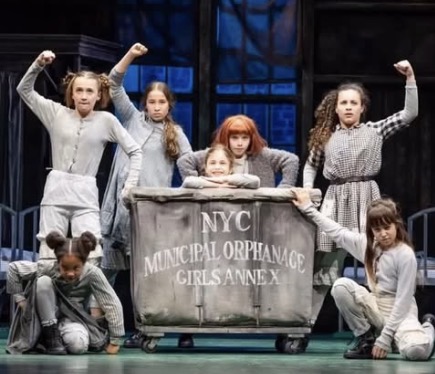 Bianca Papa with the orphans in Annie
