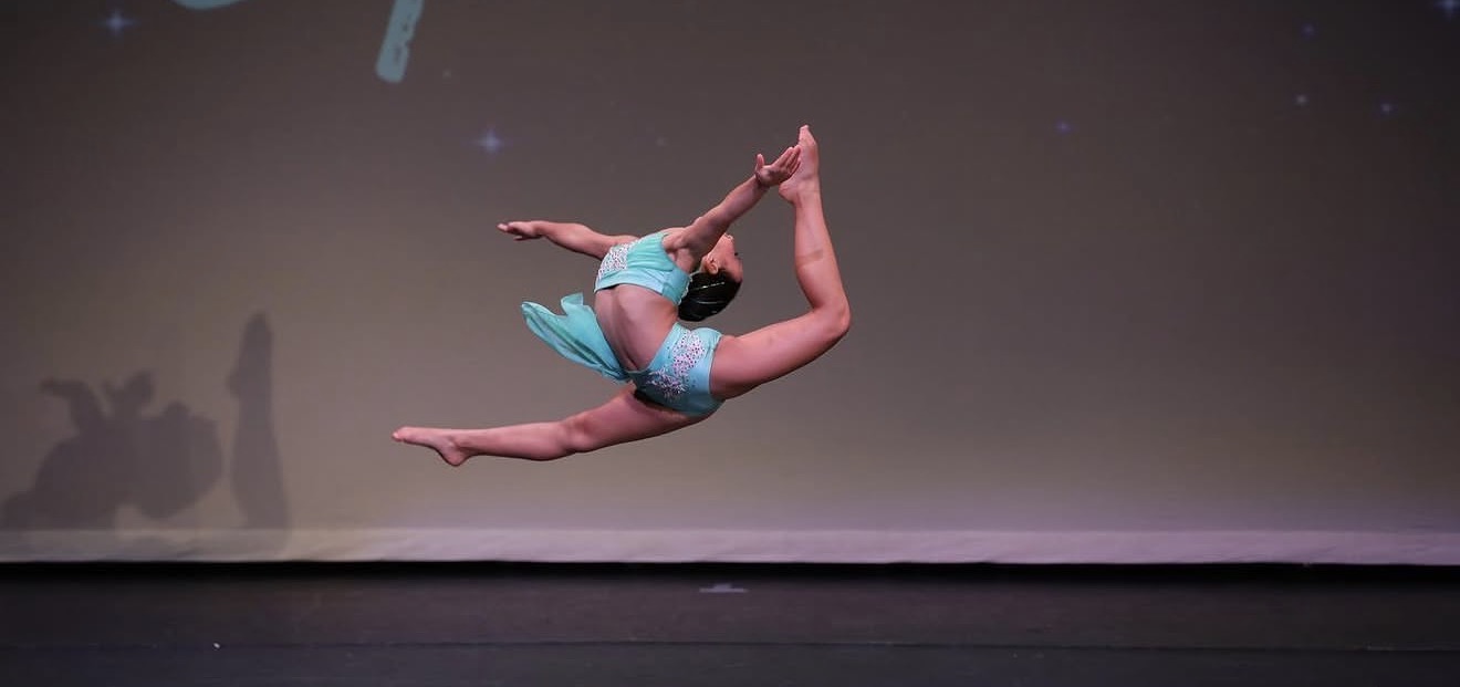 Bianca Papa performing a stage leap